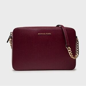 Michael Kors Burgundy Leather Jet Set Large Saffiano Crossbody Bag.